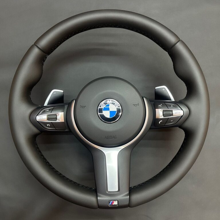 BMW X6: Искусство перетяжки руля в натуральную кожу