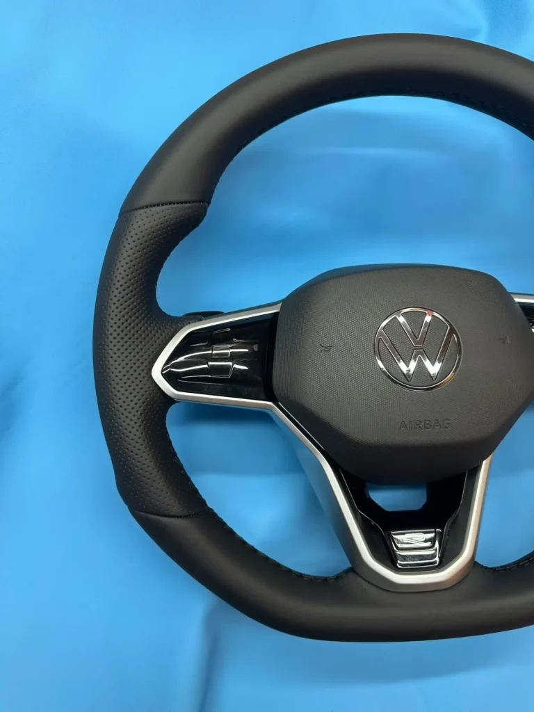 Руль Volkswagen после перетяжки натуральной кожей, левая сторона обода