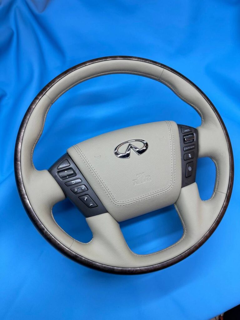 Руль Infiniti после перетяжки натуральной кожей и перетяжки подушки airbag